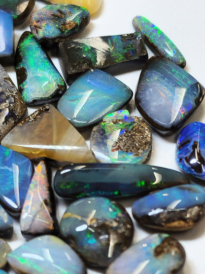 54156.0 - 50 Small Boulder Opal Free Cut Polished Faces 56.46 cts 6 - 14 mm High