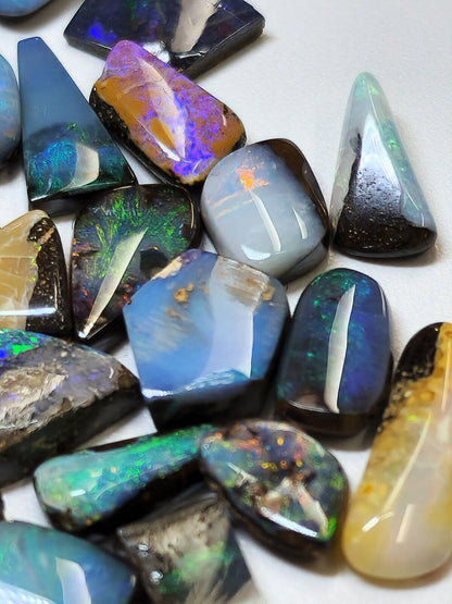 54156.0 - 50 Small Boulder Opal Free Cut Polished Faces 56.46 cts 6 - 14 mm High
