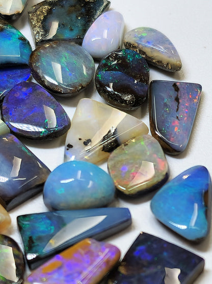 54156.0 - 50 Small Boulder Opal Free Cut Polished Faces 56.46 cts 6 - 14 mm High