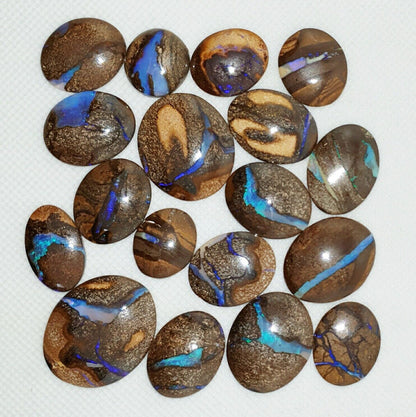 53464 - 18 Oval Cut Australian Boulder Opal with Blue Veins from 17x15 mm and up