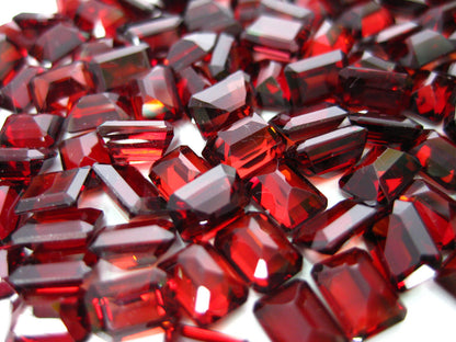 15310.2 - Wholesale Lot of 45 Pieces 7x5 mm Emerald Cut Garnets for sale