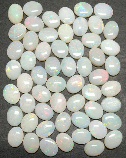 53521 -     56 Australian Natural Earth Mined Coober Pedy White Opal 9x7 mm Oval
