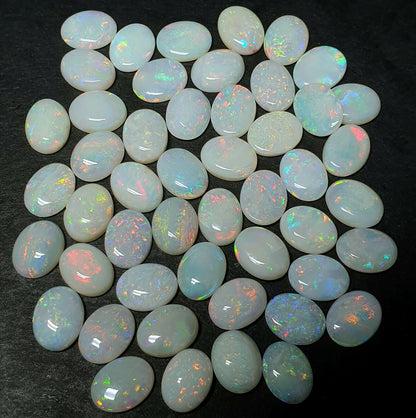 53522 -     49 Australian Natural Earth Mined Coober Pedy White Opal 9x7 mm Oval