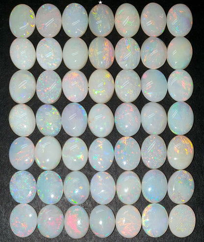 53522 -     49 Australian Natural Earth Mined Coober Pedy White Opal 9x7 mm Oval