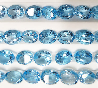 15375.0 - Wholesale Bargain Mixed Lot of 400 pcs Oval Blue Topaz 182.63 cts
