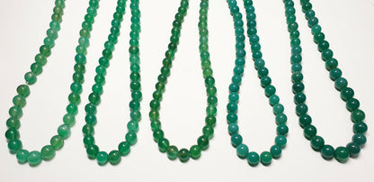 53394 - 20 Strands 6.5 - 7.5 mm Dyed Green Agate Beads Temporarily Strung 40 cm