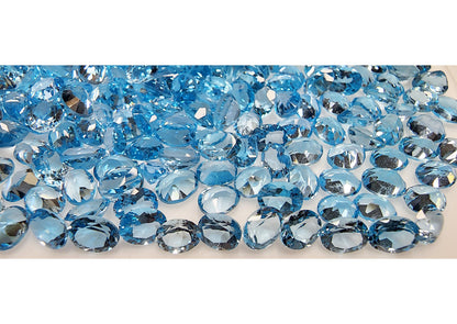 15375.0 - Wholesale Bargain Mixed Lot of 400 pcs Oval Blue Topaz 182.63 cts
