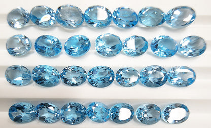 15375.0 - Wholesale Bargain Mixed Lot of 400 pcs Oval Blue Topaz 182.63 cts