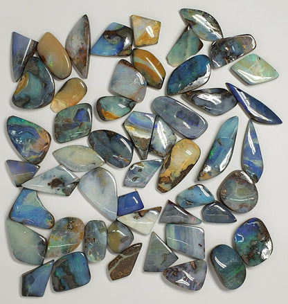 53538.0 -  50 Boulder Opal Free Cut Polished Faces 285.43 carats Smallish Sized