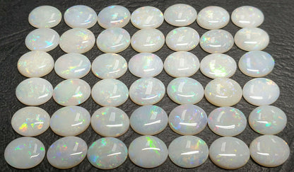 53512 -        42 Pieces Australian 10 x 8 mm Oval Cut Milky White Opal For Sale