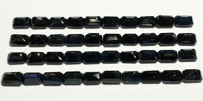 15344 - 35 Emerald Cut 6x4 mm Australian Black Sapphires about 0.80 carats each