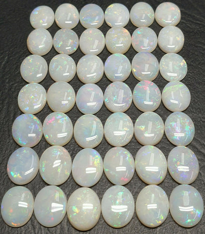 53512 -        42 Pieces Australian 10 x 8 mm Oval Cut Milky White Opal For Sale