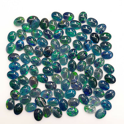 52186 - 100 Blue Blue/Green and Green 8 X 6 mm Oval Cut Australian Opal Triplets