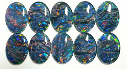 52022 - A Unique Set of 10 Matching 30x22 mm Oval Australian Opal Triplets