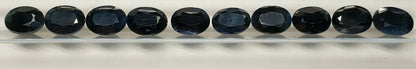 15242.11 - Lot of 10 Australian Black Sapphires 8x6 mm Oval About 1.70 Cts Each