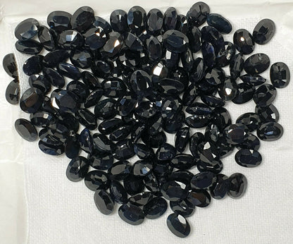 15242.11 - Lot of 10 Australian Black Sapphires 8x6 mm Oval About 1.70 Cts Each