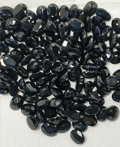 15242.11 - Lot of 10 Australian Black Sapphires 8x6 mm Oval About 1.70 Cts Each