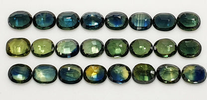 52213 - 24 Oval Cut Australian Teal, GreenS, Parti Coloured Sapphires 21.06 cts