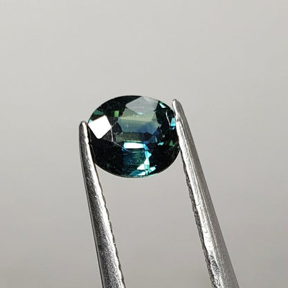 52213 - 24 Oval Cut Australian Teal, GreenS, Parti Coloured Sapphires 21.06 cts