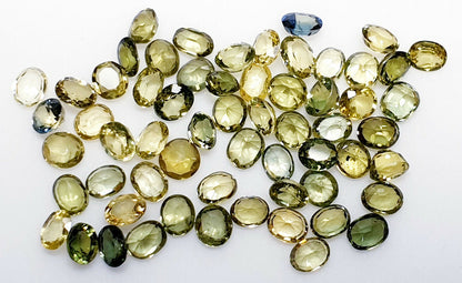 52218 - 60 Oval 3.25x2.50-3.00 mm  Australian Green, Yellow Sapphires 8.62carats