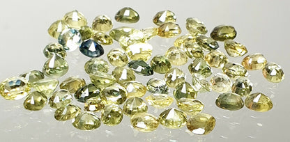 52218 - 60 Oval 3.25x2.50-3.00 mm  Australian Green, Yellow Sapphires 8.62carats