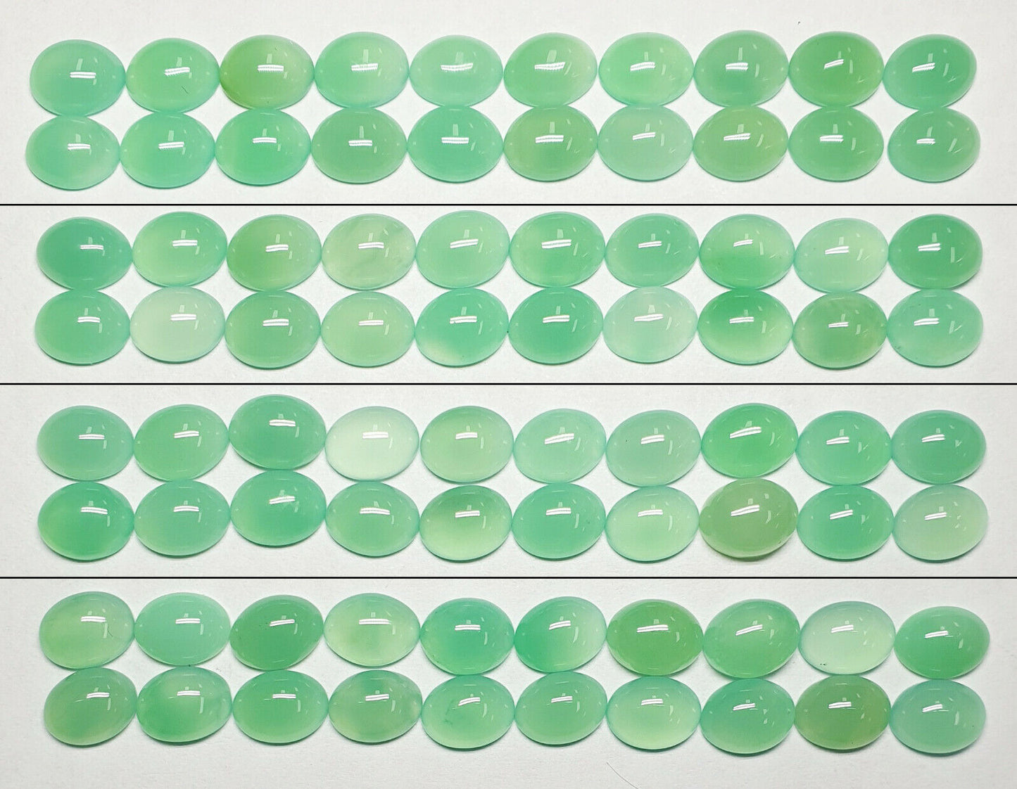 53425 - 20 Mixed Shades of Green 9x7 mm Oval Cut Cabochon Australian Chrysoprase