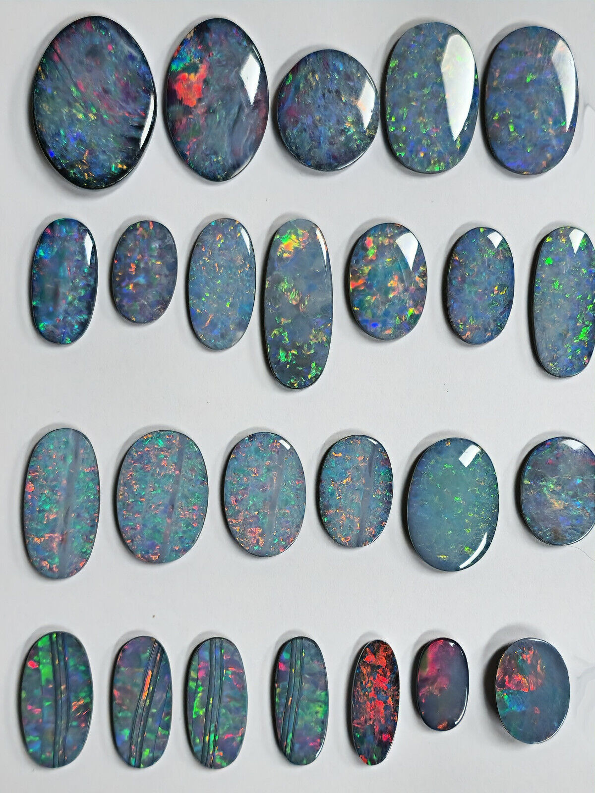54100.0 - EB - 4 lots of Oval cut NaturalAustralian Opal doublets in mixed sizes