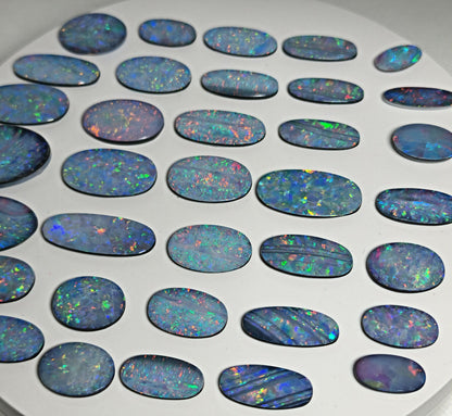 54100.0 - EB - 4 lots of Oval cut NaturalAustralian Opal doublets in mixed sizes