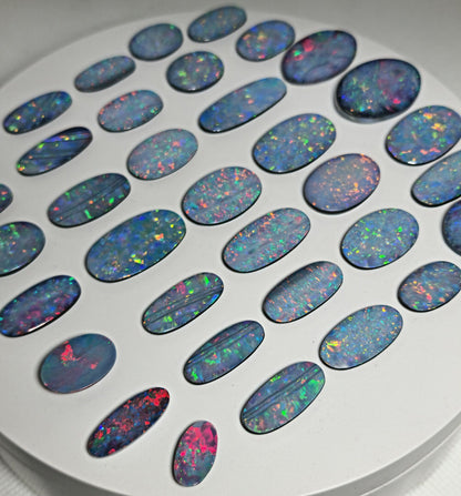 54100.0 - EB - 4 lots of Oval cut NaturalAustralian Opal doublets in mixed sizes
