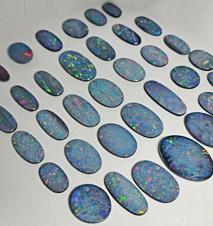 54100.0 - EB - 4 lots of Oval cut NaturalAustralian Opal doublets in mixed sizes