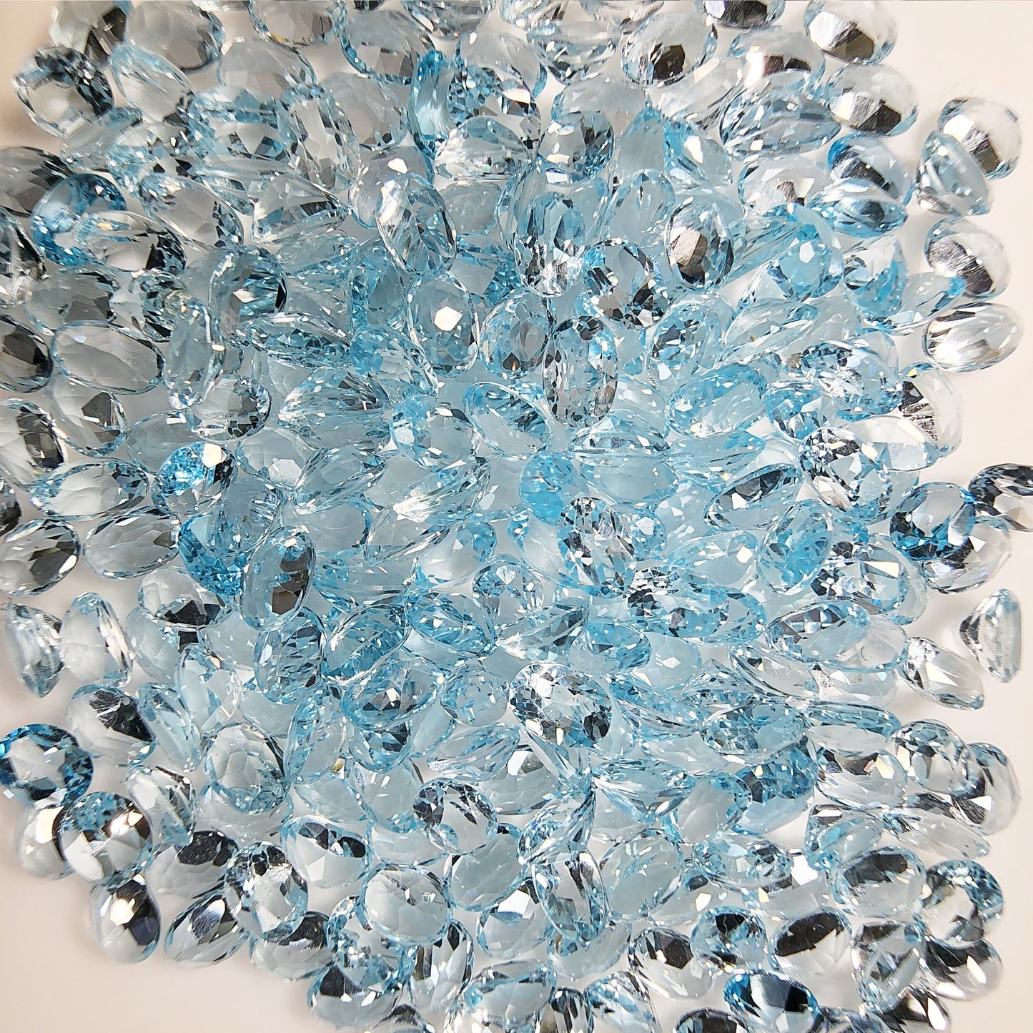 15297.0 - 6 x 4 mm Oval Cut Light Blue Topaz in Various Wholesale Lots for sale Old stock at very old price Other sizes and shapes available