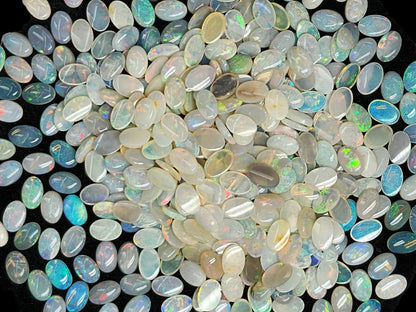 54068.0 - 6x4 mm Natural Sold White Australian Opal Oval Cabochon Cut in a Mixed Quality