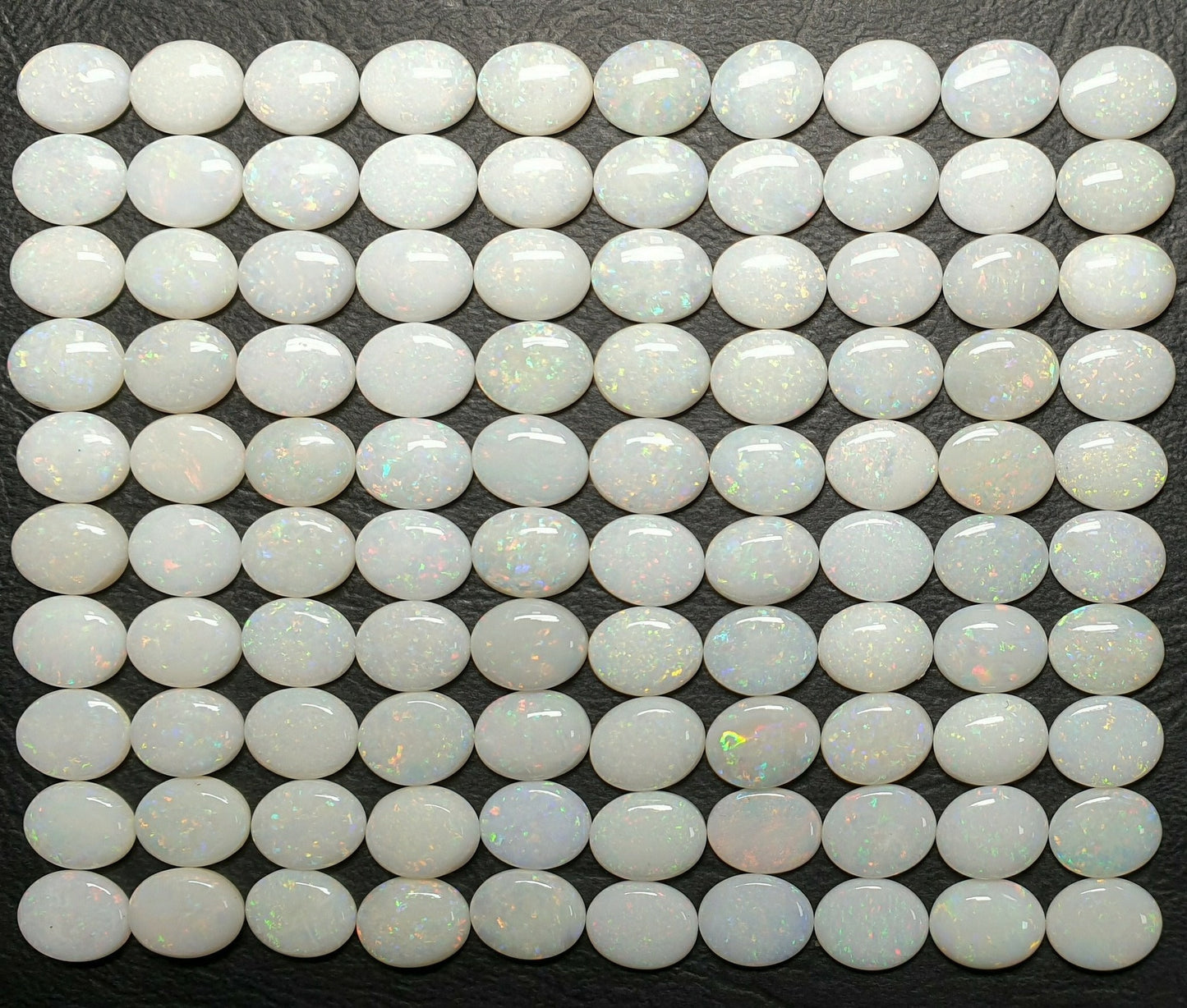 53511.0 - 10x8 mm Engros Lott på 25 stykker Naturlig australsk Solid White Opal fra Coober Pedy Til salgs Hver lot er ca 34 karat