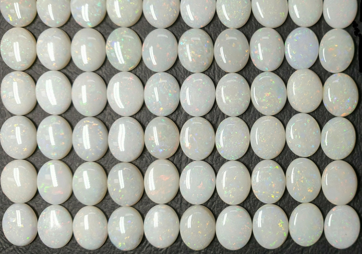 53511.0 - 10x8 mm Engros Lott på 25 stykker Naturlig australsk Solid White Opal fra Coober Pedy Til salgs Hver lot er ca 34 karat