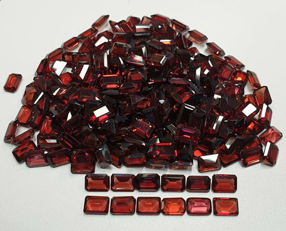 15361.0 - 7 x 5 mm Emerald Cut Garnets for sale in wholesale quantities at wholesale prices Old stock at old prices