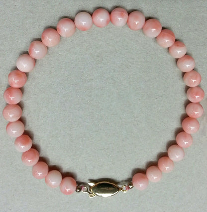 53948 - Taiwan Natural Untreated Coral in Pink Light Pink or Dark Pink Harvested from the Sea About 6.5 mm Bead Bracelet G/P Silver Clasp
