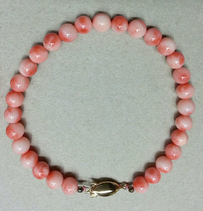 53948 - Taiwan Natural Untreated Coral in Pink Light Pink or Dark Pink Harvested from the Sea About 6.5 mm Bead Bracelet G/P Silver Clasp