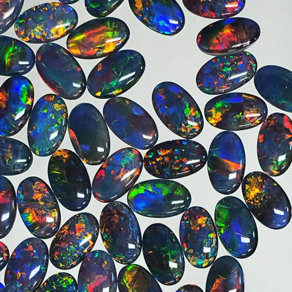 54125.0 - 10 X 6 mm Oval cut Australian Opal Triplets made with Aussie rough Opal Top grade brilliant stones Wholesale quantities and prices