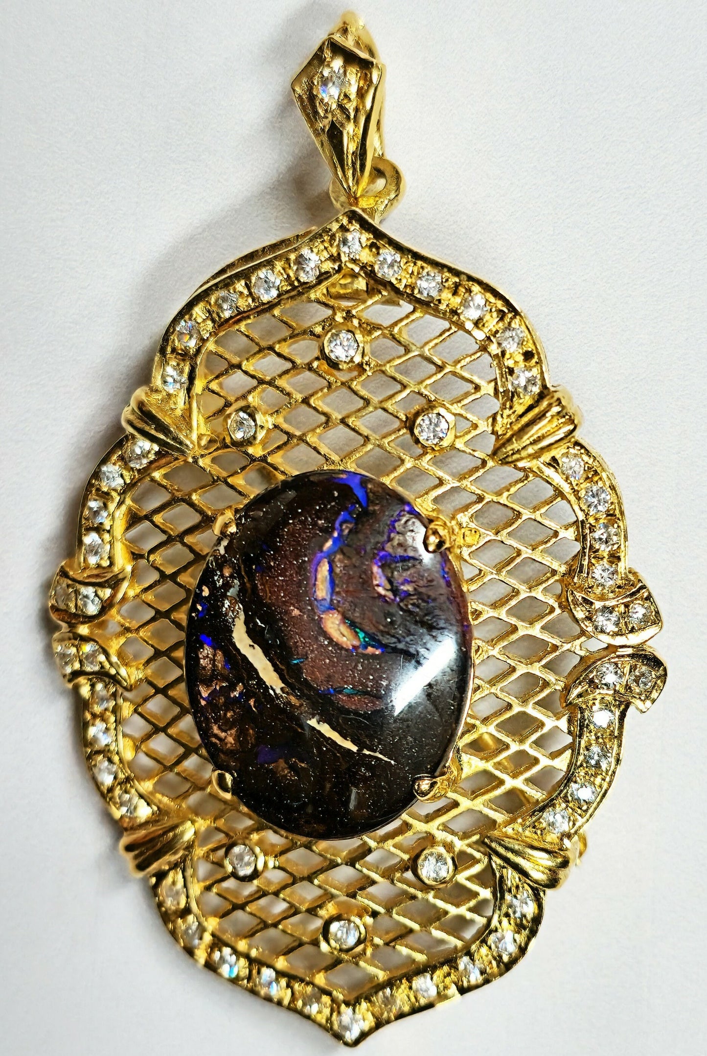 10052.30 - Utvalg av Sterling Sølv Gullbelagt kombinasjonsanheng/brosjesett med Aussie Boulder Opal og CZs valg av Opal kvalitet