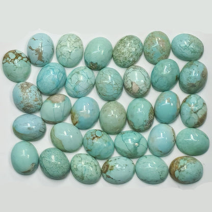 54166.0 - 11x9 mm Oval Cabochon Cut Natural Earth Mined Non-treated Australian Turquoise, this "TurqOZ" is rare and was mined in the 1970's