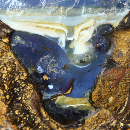 54139.0 - Natural rough Boulder Opal specimen Very interesting and a great piece mantle piece 130 x 100 x 70 mm 780 grams