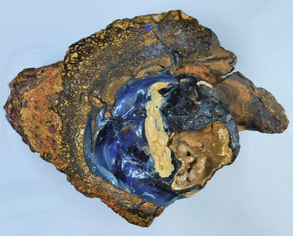 54139.0 - Natural rough Boulder Opal specimen Very interesting and a great piece mantle piece 130 x 100 x 70 mm 780 grams