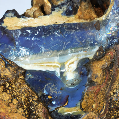 54139.0 - Natural rough Boulder Opal specimen Very interesting and a great piece mantle piece 130 x 100 x 70 mm 780 grams