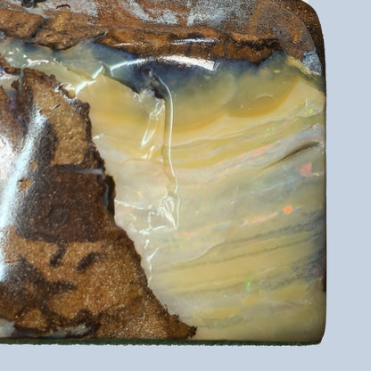 54134.0 - Boulder Opal Specimen Highly polished all over Use as a mantle ornament Great gift for an Executive's Office desk and paper weight