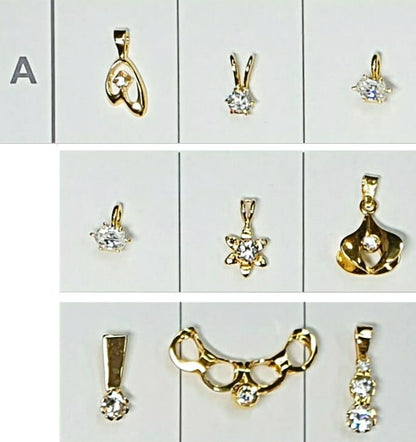 52196.0 - 7 Lots of an assortment of 9 pieces Sterling Silver Pendants Gold Plated set CZ Pendants ranging in size from very small to medium