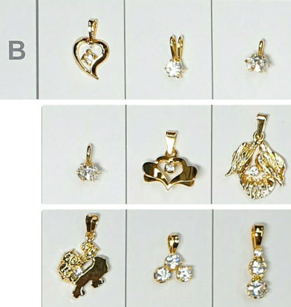 52196.0 - 7 Lots of an assortment of 9 pieces Sterling Silver Pendants Gold Plated set CZ Pendants ranging in size from very small to medium