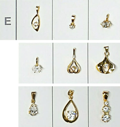 52196.0 - 7 Lots of an assortment of 9 pieces Sterling Silver Pendants Gold Plated set CZ Pendants ranging in size from very small to medium