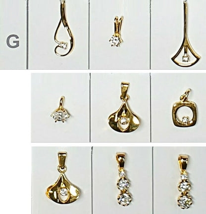 52196.0 - 7 Lots of an assortment of 9 pieces Sterling Silver Pendants Gold Plated set CZ Pendants ranging in size from very small to medium