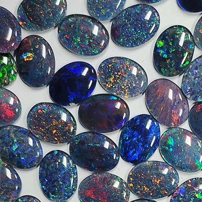 13118.0 - 16x12 mm Oval Shaped Australian Opal Triplet Made from Natural Australian Opal for sale in Wholesale Quantity at Wholesale Prices