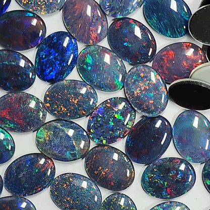 13118.0 - 16x12 mm Oval Shaped Australian Opal Triplet Made from Natural Australian Opal for sale in Wholesale Quantity at Wholesale Prices